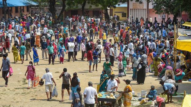 Huge crowd is seen buying vegetables and groceries at a market, during a nationwide Covid-19 lockdown, in Chennai on Saturday. (PTI Photo) Huge crowd is seen buying vegetables and groceries at a market, during a nationwide Covid-19 lockdown, in Chennai on Saturday. (PTI Photo)