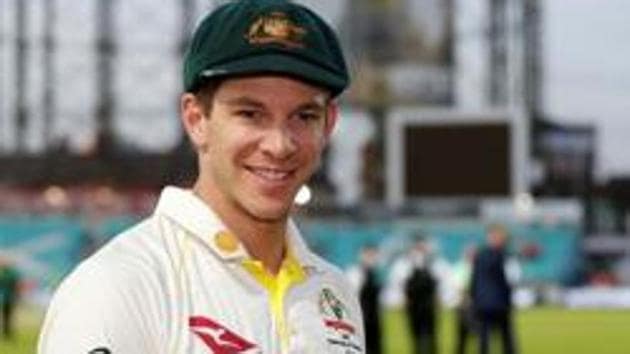 Australia's Tim Paine celebrates with the Ashes urn after drawing the series to retain the Ashes.(Action Images via Reuters)