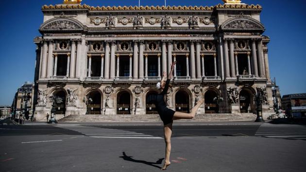 Yara al-Hasbani performs in front of Paris' Opera Garnier. She has previously danced at Place de la Republique, a traditional rallying point for protests in the French capital, where she created her first piece outside Syria in memory of the hundreds of children killed in a chemical attack near Damascus in August 2015. (Sameer Al-DOUMY / AFP)
