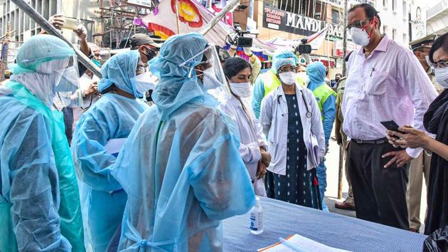 An Inter-Ministerial Central Team (IMCT) interacts with GHMC health team to take stock on COVID-19 situation at Fakeer Galli Old Malakpet, identified as containment zone in Hyderabad on Sunday. (PTI) An Inter-Ministerial Central Team (IMCT) interacts with GHMC health team to take stock on COVID-19 situation at Fakeer Galli Old Malakpet, identified as containment zone in Hyderabad on Sunday. (PTI)