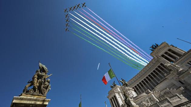 The Italian Air Force aerobatic unit Frecce Tricolori (Tricolor Arrows) perform on April 25 over the Altare della Patria - King Vittorio Emanuele II monument in Rome, on the 75th anniversary of Liberation Day, which marks the fall of Nazi occupation in 1945, during the country's lockdown aimed at curbing the spread of the COVID-19 infection. (Tiziana Fabi / AFP)