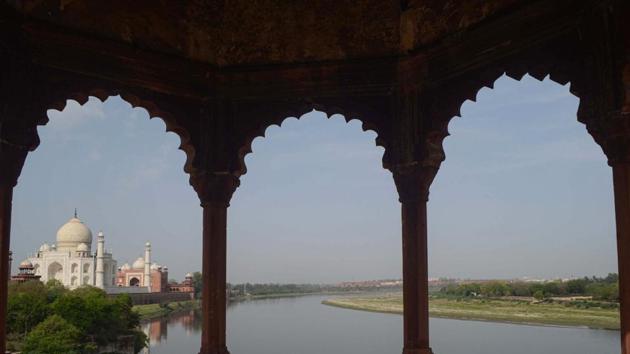 A view of the historic Taj Mahal near the banks of river Yamuna during a nationwide lockdown to curb the spread of coronavirus.(PTI)