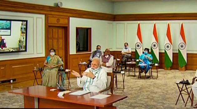 In his address, Modi underlined the key challenge India was facing — that of balancing lives and livelihood. With economic activity coming to a halt, workers in the unorganised sector are staring at a bleak future and millions of jobs are on the line in the organised sector. (PTI) In his address, Modi underlined the key challenge India was facing — that of balancing lives and livelihood. With economic activity coming to a halt, workers in the unorganised sector are staring at a bleak future and millions of jobs are on the line in the organised sector. (PTI)