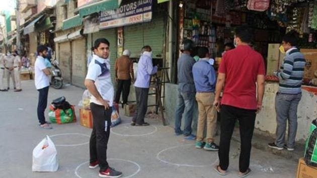 People shop for essentials at a grocery store while maintaining social distance in Trunk Market, Sadar Bazar, Gurugram, during Covid-19 lockdown. (Yogendra Kumar/HT File Photo) People shop for essentials at a grocery store while maintaining social distance in Trunk Market, Sadar Bazar, Gurugram, during Covid-19 lockdown. (Yogendra Kumar/HT File Photo)