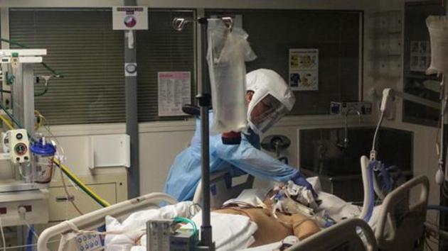 Nurse Leah Silver cares for a coronavirus disease (COVID-19) patient in the COVID ICU at the University of Washington Medical Center - Montlake during the COVID-19 outbreak in Seattle, Washington on  April 24, 2020. (REUTERS)