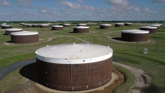 An aerial drone view of a crude oil storage facility on April 23, 2020 in Cushing, Oklahoma. Governor Stitt has said that ‘over-production of oil continues to threaten the economy.’ (AFP) An aerial drone view of a crude oil storage facility on April 23, 2020 in Cushing, Oklahoma. Governor Stitt has said that ‘over-production of oil continues to threaten the economy.’ (AFP)