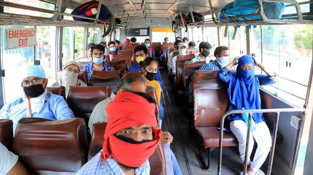 Students from various districts of Uttar Pradesh stand in a queue to board a bus as UP government arranged buses for students during government imposed nationwide lockdown as a preventive measure against the Coronavirus, in Prayagraj on Tuesday. (ANI) Students from various districts of Uttar Pradesh stand in a queue to board a bus as UP government arranged buses for students during government imposed nationwide lockdown as a preventive measure against the Coronavirus, in Prayagraj on Tuesday. (ANI)