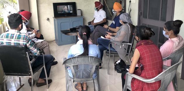 The district childline workers during the video-conferencing in Ludhiana on Tuesday. (HT Photo) The district childline workers during the video-conferencing in Ludhiana on Tuesday. (HT Photo)