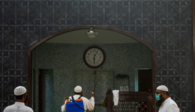 A worker (C) sprays disinfectant at a mosque ahead of the Muslim holy month of Ramadan during a government-imposed nationwide lockdown as a preventive measure against the COVID-19 coronavirus, in Karachi on April 22, 2020. (AFP) A worker (C) sprays disinfectant at a mosque ahead of the Muslim holy month of Ramadan during a government-imposed nationwide lockdown as a preventive measure against the COVID-19 coronavirus, in Karachi on April 22, 2020. (AFP)