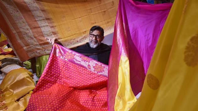 A master weaver showcases his collection of handloom weaves.(Photo: Raj K Raj/HT(Picture for representational purpose only))