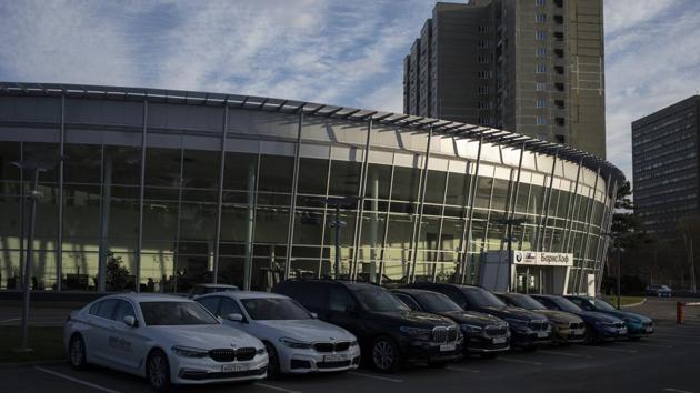 In this photo taken on Thursday, April 23, 2020, new cars are parked in front of the closed car dealership in Moscow, Russia.(AP)