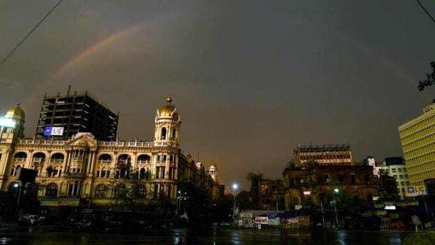 A rainbow forms over a building after a mild shower in Kolkata, on April 23. “Rains will not subside immediately. There will be another strong wet spell in northwest India from May 4 to 6,” said RK Jenamani, senior scientist at the National Weather Forecasting Centre. (Ashok Bhaumik / PTI)