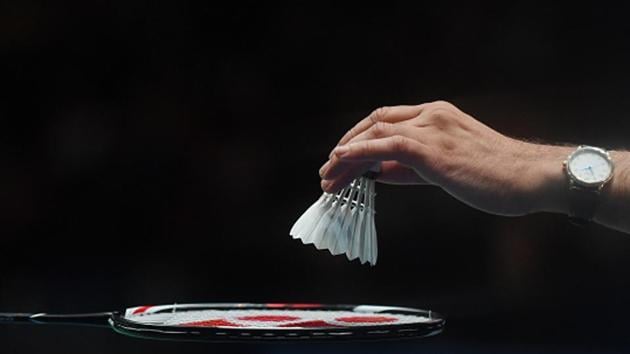 A match official places a new shuttlecock on a racket (Getty Images) A match official places a new shuttlecock on a racket (Getty Images)