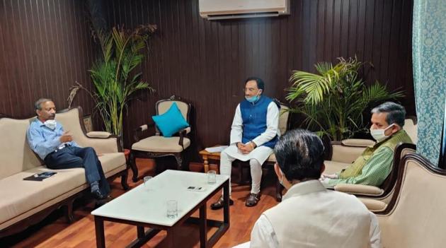HRD minister with secretary Amit Khare and UGC officials. (HT) HRD minister with secretary Amit Khare and UGC officials. (HT)