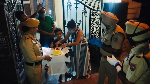 Cops celebrating the eight-year-old child’s birthday in Jalandhar on Wednesday. (HT PHOTO) Cops celebrating the eight-year-old child’s birthday in Jalandhar on Wednesday. (HT PHOTO)