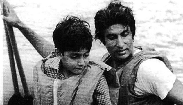 Abhishek Bachchan and Amitabh Bachchan on a kayak.