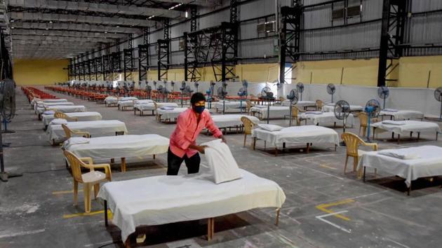 Workers prepare a quarantine centre for COVID-19 patients at Bombay Exhibition Centre, in Mumbai’s Goregaon on April 28. The total number of the patients to be discharged from hospitals has reached 1,388. (PTI) Workers prepare a quarantine centre for COVID-19 patients at Bombay Exhibition Centre, in Mumbai’s Goregaon on April 28. The total number of the patients to be discharged from hospitals has reached 1,388. (PTI)
