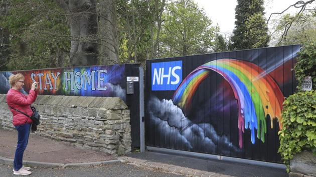 Rainbow National Health Service (NHS) graffiti painted on a private gate in Newcastle, England, as the UK continues in lockdown to help curb the spread of the coronavirus, Thursday April 30, 2020. (AP) Rainbow National Health Service (NHS) graffiti painted on a private gate in Newcastle, England, as the UK continues in lockdown to help curb the spread of the coronavirus, Thursday April 30, 2020. (AP)