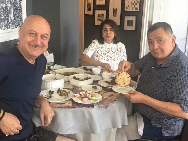 Anupam Kher with Neetu Singh and Rishi Kapoor in New York. Anupam Kher with Neetu Singh and Rishi Kapoor in New York.