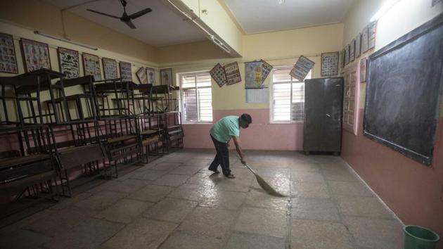 The Shree Chhatrapati Shivaji Maharaj Vidyaniketan school in Shukrawar peth is being cleaned to be used as a temporary shelter for residents from the red containment areas on Tuesday. (Pratham Gokhale/HT Photo) The Shree Chhatrapati Shivaji Maharaj Vidyaniketan school in Shukrawar peth is being cleaned to be used as a temporary shelter for residents from the red containment areas on Tuesday. (Pratham Gokhale/HT Photo)