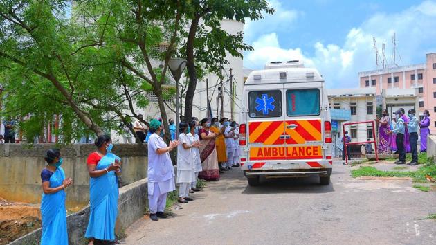 Health staffs clap as 32-year-old Tripura State Rifles jawan who is second and the last patient of Covid-19 from the state discharged from the GB hospital after he tested negative for coronavirus, in Agartala. (ANI) Health staffs clap as 32-year-old Tripura State Rifles jawan who is second and the last patient of Covid-19 from the state discharged from the GB hospital after he tested negative for coronavirus, in Agartala. (ANI)