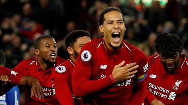 Liverpool's Divock Origi celebrates scoring their first goal with Virgil van Dijk and team mates. (REUTERS) Liverpool's Divock Origi celebrates scoring their first goal with Virgil van Dijk and team mates. (REUTERS)