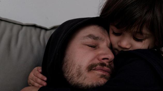 Marzio Toniolo takes a selfie, as his daughter Bianca holds his face, on a rainy day at home. “The worst moment was when the first person in San Fiorano died. I know the son. I was already under a lot of stress,” Toniolo said. “That night, I almost had a panic attack and took a tranquiliser for the first time in years.” (Marzio Toniolo via REUTERS) Marzio Toniolo takes a selfie, as his daughter Bianca holds his face, on a rainy day at home. “The worst moment was when the first person in San Fiorano died. I know the son. I was already under a lot of stress,” Toniolo said. “That night, I almost had a panic attack and took a tranquiliser for the first time in years.” (Marzio Toniolo via REUTERS)