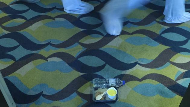 Food is seen placed outside the door of the room Rafiq Maqbool was placed in during his quarantine. The staff would ring his room’s doorbell, put food outside and leave. (Rafiq Maqbool / AP) Food is seen placed outside the door of the room Rafiq Maqbool was placed in during his quarantine. The staff would ring his room’s doorbell, put food outside and leave. (Rafiq Maqbool / AP)