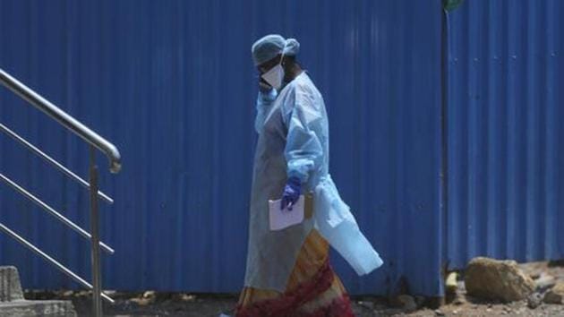 An Indian Health worker walks inside a containment zone to collect details during lockdown to prevent the spread of new coronavirus in Hyderabad, India, in Hyderabad, India, Sunday, April 26, 2020. (AP) An Indian Health worker walks inside a containment zone to collect details during lockdown to prevent the spread of new coronavirus in Hyderabad, India, in Hyderabad, India, Sunday, April 26, 2020. (AP)