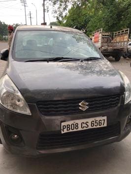 The accused reportedly attempted to run over assistant sub-inspector (ASI) Mulkh Raj when the cop signalled him to stop his Eritga at a checkpoint near Milkbar Chowk near Model Town (HT PHOTO) The accused reportedly attempted to run over assistant sub-inspector (ASI) Mulkh Raj when the cop signalled him to stop his Eritga at a checkpoint near Milkbar Chowk near Model Town (HT PHOTO)