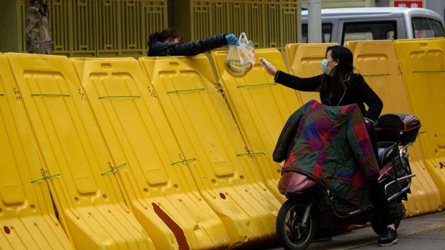 The surge in online sales allowed many Chinese companies to create temporary employment schemes, absorbing self-employed daily wage earners affected due to the lockdown(AFP)