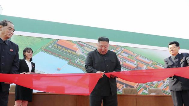 In this Friday, May 1, 2020, photo provided by the North Korean government, North Korean leader Kim Jong Un, center, cuts a tape, watched by his sister Kim Yo Jong, during his visit to a fertilizer factory in Sunchon, South Pyongan province, near Pyongyang. (AP) In this Friday, May 1, 2020, photo provided by the North Korean government, North Korean leader Kim Jong Un, center, cuts a tape, watched by his sister Kim Yo Jong, during his visit to a fertilizer factory in Sunchon, South Pyongan province, near Pyongyang. (AP)