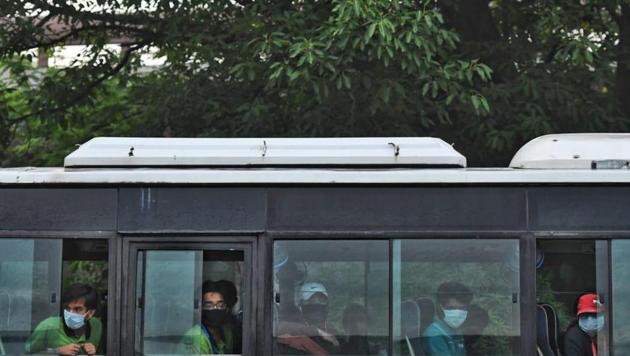 The students from Delhi, stranded in Kota due to Covid-19 lockdown, arrive at Kashmere Gate ISBT on Sunday morning. (Biplov Bhuyan/HT Photo) The students from Delhi, stranded in Kota due to Covid-19 lockdown, arrive at Kashmere Gate ISBT on Sunday morning. (Biplov Bhuyan/HT Photo)
