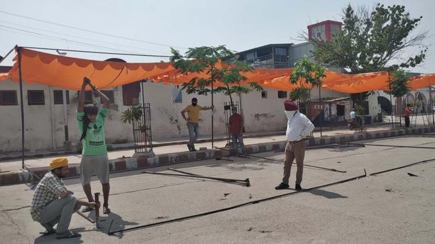 Tents set up at the Ludhiana railways station to accommodate migrants who pour in to take the trains to their home states. (GURPREET SINGH/HT) Tents set up at the Ludhiana railways station to accommodate migrants who pour in to take the trains to their home states. (GURPREET SINGH/HT)
