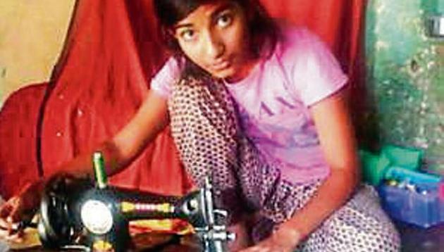 A girl student stitching face masks at her home in Prayagraj (HT) A girl student stitching face masks at her home in Prayagraj (HT)