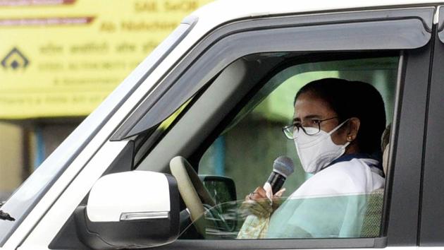 West Bengal Chief Minister Mamata Banerjee addresses people from inside her car about the coronavirus disease, in Kolkata last month. (PTI File Photo) West Bengal Chief Minister Mamata Banerjee addresses people from inside her car about the coronavirus disease, in Kolkata last month. (PTI File Photo)