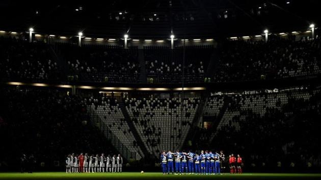General view as the teams observe a minutes silence before the match.(REUTERS)