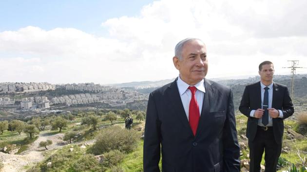 Israeli Prime Minister Benjamin Netanyahu stands at an overview of the Israeli settlement of Har Homa, located in an area of the Israeli-occupied West Bank, that Israel annexed to Jerusalem after the region's capture in the 1967 Middle East war. (REUTERS) Israeli Prime Minister Benjamin Netanyahu stands at an overview of the Israeli settlement of Har Homa, located in an area of the Israeli-occupied West Bank, that Israel annexed to Jerusalem after the region's capture in the 1967 Middle East war. (REUTERS)