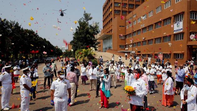 Indian Navy’s Chetak helicopter showers flower petals on the premises of a hospital as part of Armed Forces’ gestures to show gratitude to frontline workers - doctors, nurses and police personnel - engaged in fighting the coronavirus disease (COVID-19) outbreak, in Visakhapatnam, on May 3. (R Narendra / REUTERS) Indian Navy’s Chetak helicopter showers flower petals on the premises of a hospital as part of Armed Forces’ gestures to show gratitude to frontline workers - doctors, nurses and police personnel - engaged in fighting the coronavirus disease (COVID-19) outbreak, in Visakhapatnam, on May 3. (R Narendra / REUTERS)