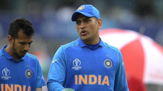 India's Mahendra Singh Dhoni (R) speaks with teammate Yuzvendra Chahal (AFP) India's Mahendra Singh Dhoni (R) speaks with teammate Yuzvendra Chahal (AFP)