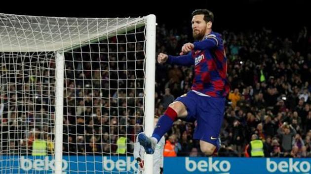 Barcelona's Lionel Messi celebrates scoring their first goal. (REUTERS) Barcelona's Lionel Messi celebrates scoring their first goal. (REUTERS)