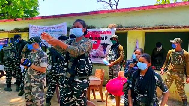 A CRPF woman commando tells people about the importance of handwashing amid coronavirus pandemic, in Sukma, Chhattisgarh. (ANI File) A CRPF woman commando tells people about the importance of handwashing amid coronavirus pandemic, in Sukma, Chhattisgarh. (ANI File)