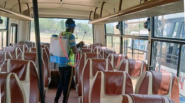 Buses being sanitized before their journey to Odisha and Chhattisgarh from West Singhbhum district of Jharkhand to bring back migrant workers in Chaibasa, India, on Sunday , May 3, 2020. (Manoj Kumar/ Hindustan Times) Buses being sanitized before their journey to Odisha and Chhattisgarh from West Singhbhum district of Jharkhand to bring back migrant workers in Chaibasa, India, on Sunday , May 3, 2020. (Manoj Kumar/ Hindustan Times)