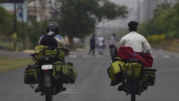 Delivery boys carry essentials during a nationwide lockdown to curb spread of coronavirus, in Noida, India, on Sunday, May 3, 2020. (Virendra Singh Gosain/HT PHOTO) Delivery boys carry essentials during a nationwide lockdown to curb spread of coronavirus, in Noida, India, on Sunday, May 3, 2020. (Virendra Singh Gosain/HT PHOTO)
