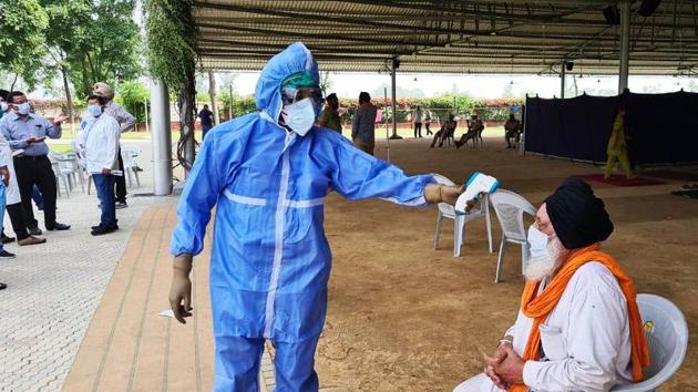 A total of 795 of about 4,100 pilgrims who returned from Hazur Sahib in Maharashtra’s Nanded have so far tested positive for the coronavirus disease. (HT Photo) A total of 795 of about 4,100 pilgrims who returned from Hazur Sahib in Maharashtra’s Nanded have so far tested positive for the coronavirus disease. (HT Photo)