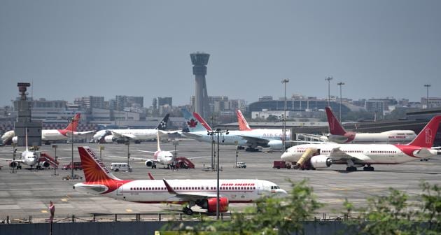 Planes are seen parked at Mumbai airport, Many flights has been cancelled during the outbreak of the new Coronavirus, COVID-19 in Mumbai, India, on Saturday, March 21, 2020.(Satish Bate/HT Photo)