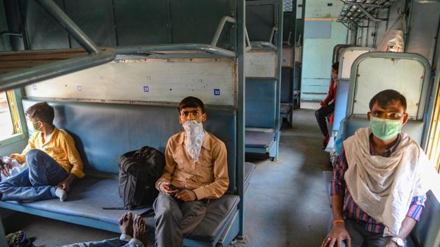 Migrants maintain social distance on a Shramik Express train that left Jalandhar for Daltonganj in Jharkhand on Tuesday.(PTI) Migrants maintain social distance on a Shramik Express train that left Jalandhar for Daltonganj in Jharkhand on Tuesday.(PTI)