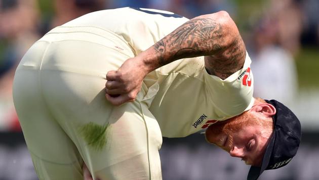 England's paceman Ben Stokes gives shine to the ball(AFP) England's paceman Ben Stokes gives shine to the ball(AFP)