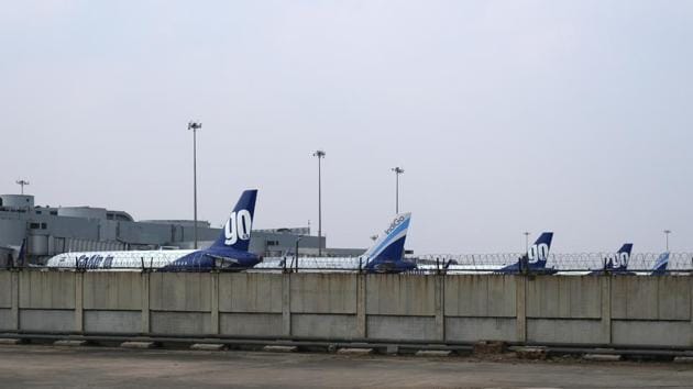 Grounded aircraft stand at Terminal 2 at the Indira Gandhi International Airport during a lockdown implemented due to the coronavirus in New Delhi.(Bloomberg) Grounded aircraft stand at Terminal 2 at the Indira Gandhi International Airport during a lockdown implemented due to the coronavirus in New Delhi.(Bloomberg)