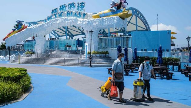 The Ocean Park theme park is closed because of the pandemic but the penguins’ carers have been kept busy with their upkeep. (Anthony Wallace / AFP) 